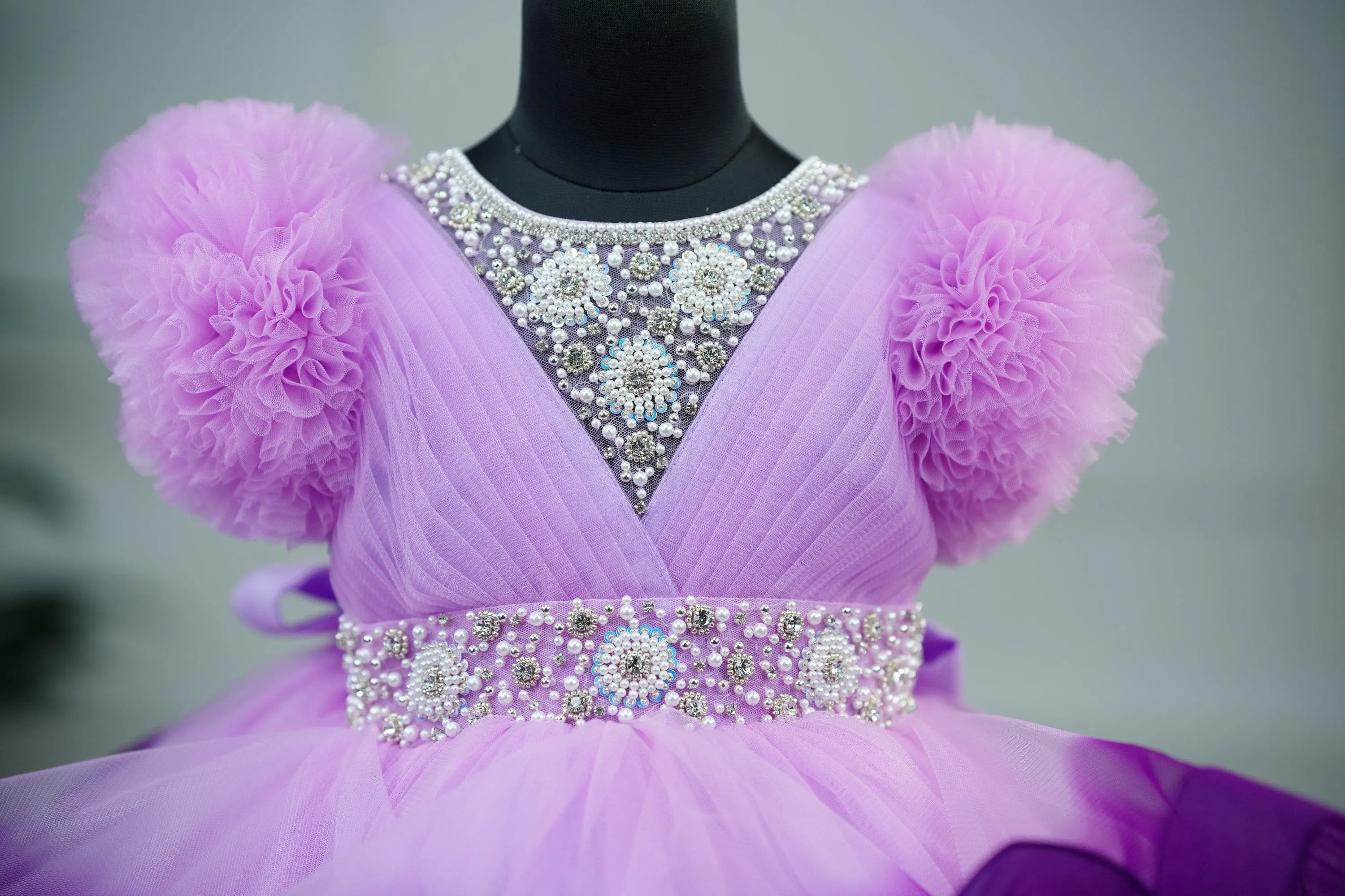 Pre-Order:  Lavender Pink and Grape Purple twirled gown with rich white bead work gown