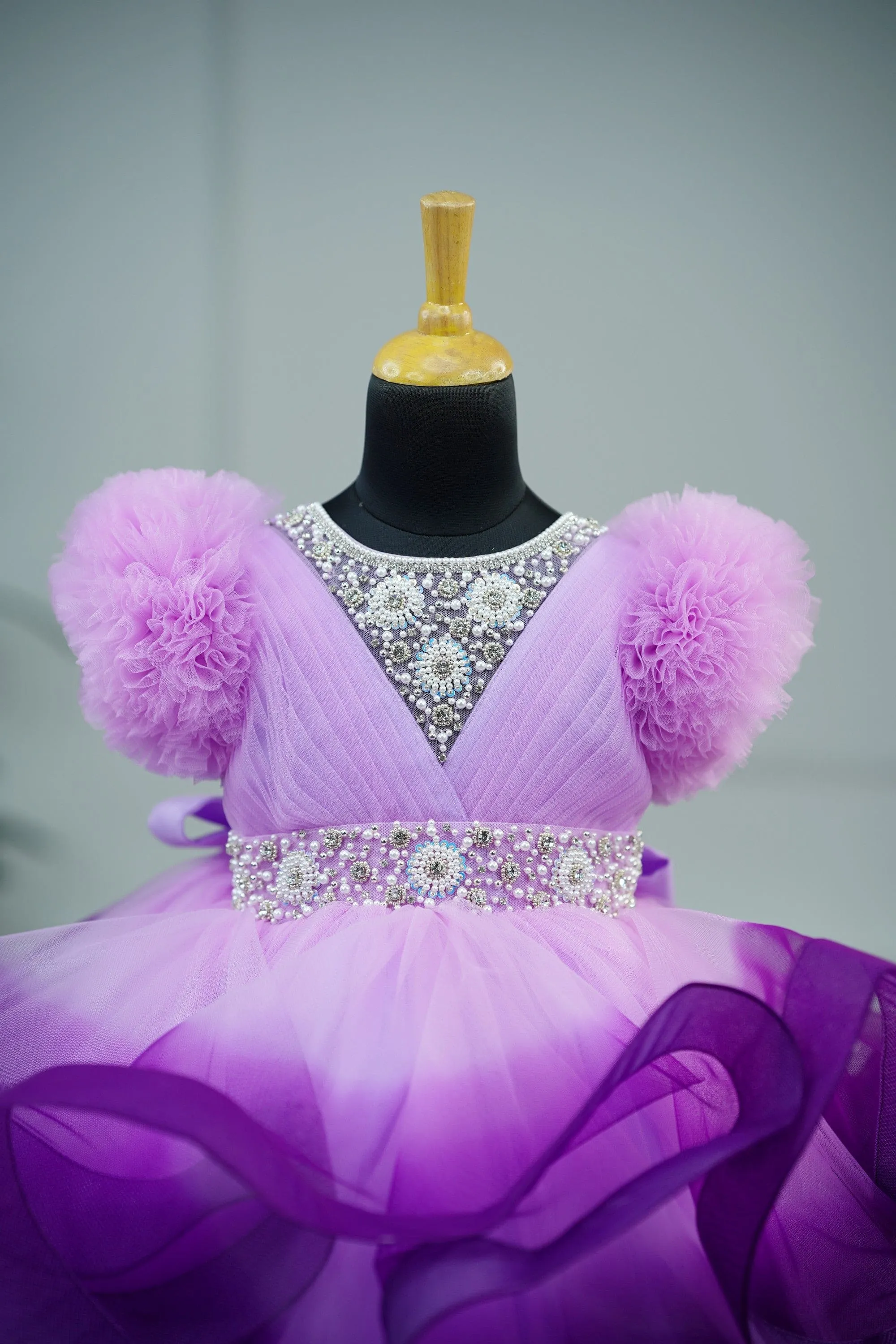 Pre-Order:  Lavender Pink and Grape Purple twirled gown with rich white bead work gown
